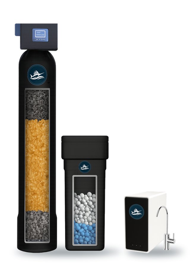 Three pieces of home water treatment equipment side by side: a tall black filter tank, a black salt tank for a water softener, and a white under-sink drinking water unit with a chrome faucet